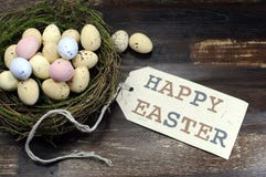 Happy Easter Candy Easter Eggs In Birds Nest On Dark Vintage Recycled Wood With Tag Stock Image Happy Easter Candy Easter Eggs In Birds Nest On Dark Vintage Recycled Wood With Tag Stock Image