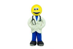 A happy emoticon dressed as a doctor and smiling made in plasticine Stock Photography A happy emoticon dressed as a doctor and smiling made in plasticine Stock Photography