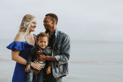 Happy family at a beach royalty free stock images Happy family at a beach royalty free stock images