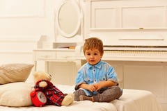 Happy family and childrens day. little boy play at home. happy childhood. Care and development. child play toys. Little royalty free stock image Happy family and childrens day. little boy play at home. happy childhood. Care and development. child play toys. Little royalty free stock image