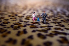 Happy Family Concept. present by Miniature Figure of Father, Mot royalty free stock photos Happy Family Concept. present by Miniature Figure of Father, Mot royalty free stock photos