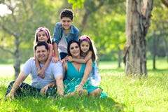 Happy family having fun outdoors in spring park stock photo Happy family having fun outdoors in spring park stock photo