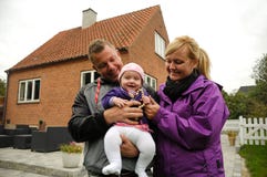 Happy Family In Front Of House Stock Images Happy Family In Front Of House Stock Images