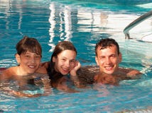 Happy Family In The Swimming Pool Stock Photo