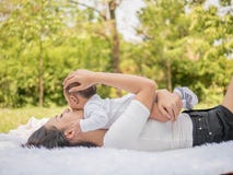 Happy Family, Mother And Baby Hug And Happy In The Summer On The Nature Background Stock Photo Happy Family, Mother And Baby Hug And Happy In The Summer On The Nature Background Stock Photo