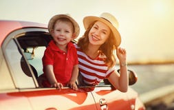 Happy family mother and child boy goes to summer travel trip in car royalty free stock images Happy family mother and child boy goes to summer travel trip in car royalty free stock images