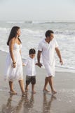 Mother, Father & Boy Child Family Walking on Beach royalty free stock photography Mother, Father & Boy Child Family Walking on Beach royalty free stock photography