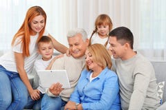 Happy family with tablet stock images Happy family with tablet stock images