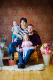 Happy family waiting for a holiday royalty free stock image Happy family waiting for a holiday royalty free stock image
