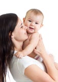 Happy family. A young mother with baby kissing and hugging. Stock Photography Happy family. A young mother with baby kissing and hugging. Stock Photography