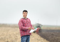 Happy farmer on the field Royalty Free Stock Images Happy farmer on the field Royalty Free Stock Images