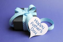 Happy Fathers Day Blue Theme Gift And Message On Heart Tag Stock Photo Happy Fathers Day Blue Theme Gift And Message On Heart Tag Stock Photo