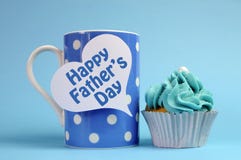 Happy Fathers Day Message On Blue Theme Polka Dot Coffee Mug With Cupcake. Stock Photography