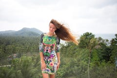The happy girl, being in tropics, is a lot of seas, grass, trees, warm photo, girl the being at the sea, fashionable zhknshchina. Royalty Free Stock Photos The happy girl, being in tropics, is a lot of seas, grass, trees, warm photo, girl the being at the sea, fashionable zhknshchina. Royalty Free Stock Photos
