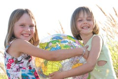 Happy Girls Holding Globe Royalty Free Stock Photo Happy Girls Holding Globe Royalty Free Stock Photo