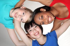 Happy Group Huddle By Mixed Race Student Girls Stock Photo Happy Group Huddle By Mixed Race Student Girls Stock Photo