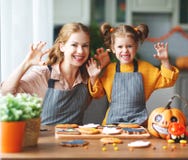 Happy Halloween! family mother and daughter getting ready for royalty free stock image Happy Halloween! family mother and daughter getting ready for royalty free stock image