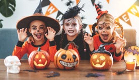 Happy Halloween! a group of children in suits and with pumpkins Stock Photography Happy Halloween! a group of children in suits and with pumpkins Stock Photography