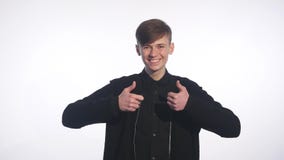 Happy handsome man showing thumbs up stock video footage Happy handsome man showing thumbs up stock video footage