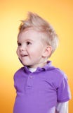 Happy Interested Little Boy In Violet Royalty Free Stock Photos Happy Interested Little Boy In Violet Royalty Free Stock Photos