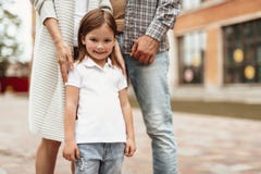 Happy kid spending leisure with parents stock photos Happy kid spending leisure with parents stock photos