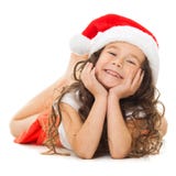 Happy little girl in Santa hat royalty free stock image Happy little girl in Santa hat royalty free stock image