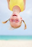 Happy Little Girl Upside Down Stock Photography Happy Little Girl Upside Down Stock Photography