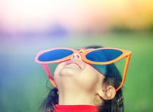 Happy Little Girl With Big Sunglasses Royalty Free Stock Photography