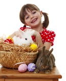 Happy Little Girl With Two Easter Rabbits Stock Image