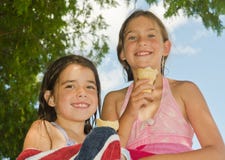 Little girls with an ice cream cones Royalty Free Stock Photos Little girls with an ice cream cones Royalty Free Stock Photos