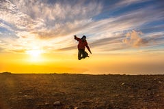 Happy Man Jumping For Joy At Sunset. Success, Winner, Happiness, Ttavel Concept Royalty Free Stock Photo