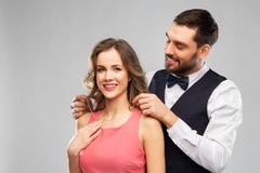 Happy man puts necklace on his girlfriend royalty free stock images Happy man puts necklace on his girlfriend royalty free stock images