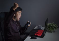 Happy man using joystick to playing games Royalty Free Stock Image Happy man using joystick to playing games Royalty Free Stock Image