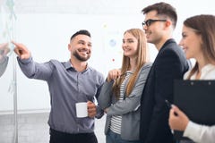 Happy Manager Explaining Business Strategy To Staffs Royalty Free Stock Photos Happy Manager Explaining Business Strategy To Staffs Royalty Free Stock Photos