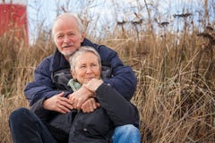 Happy mature couple relaxing baltic sea dunes stock photos Happy mature couple relaxing baltic sea dunes stock photos