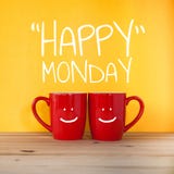 Happy Monday word.Two cups of coffee