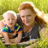 Happy mother and baby with Down syndrome