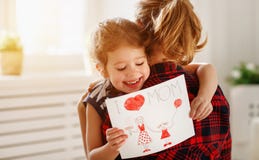 Happy mother`s day! Daughter gives her mother an postcard Stock Photos Happy mother`s day! Daughter gives her mother an postcard Stock Photos