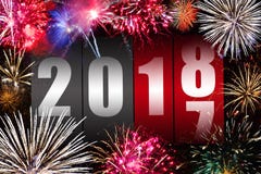 Happy New Year 2018. Counter changing year 2017 to 2018 with fireworks display. Happy new year concept vector illustration Happy New Year 2018. Counter changing year 2017 to 2018 with fireworks display. Happy new year concept vector illustration