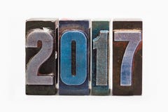Happy new year 2017 greeting card with colorful retro letterpress types. Creative design element on white background Stock Photo Happy new year 2017 greeting card with colorful retro letterpress types. Creative design element on white background Stock Photo