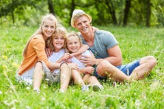 Happy parents and their two children stock image Happy parents and their two children stock image