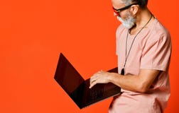 Happy portrait of trendy pensioner enjoying the use of new laptop royalty free stock photos Happy portrait of trendy pensioner enjoying the use of new laptop royalty free stock photos