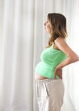 Happy pregnant woman indoors royalty free stock photo Happy pregnant woman indoors royalty free stock photo