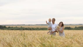 Happy relationship, young family walking together stock images Happy relationship, young family walking together stock images