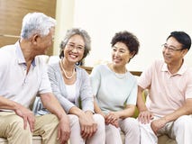 https://thumbs.dreamstime.com/t/happy-senior-asian-couples-chatting-home-two-active-sitting-couch-smiling-80460886.jpg