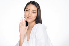 Happy smiling beautiful asian woman using cotton pad cleaning skin stock photos Happy smiling beautiful asian woman using cotton pad cleaning skin stock photos