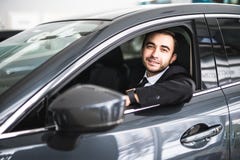 Happy Smiling Driver In The Car, Portrait Of Young Successful Business Man Stock Photography