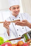Professional male chef cooking Stock Images Professional male chef cooking Stock Images