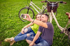Smiling young couple taking selfie stock image Smiling young couple taking selfie stock image