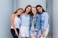 Happy smiling young girls are laughing and looking at the camera stock photo Happy smiling young girls are laughing and looking at the camera stock photo